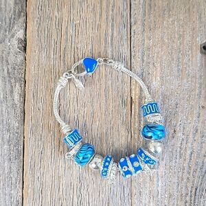 Blue beaded enamel and crystal charm bracelet  8" length
